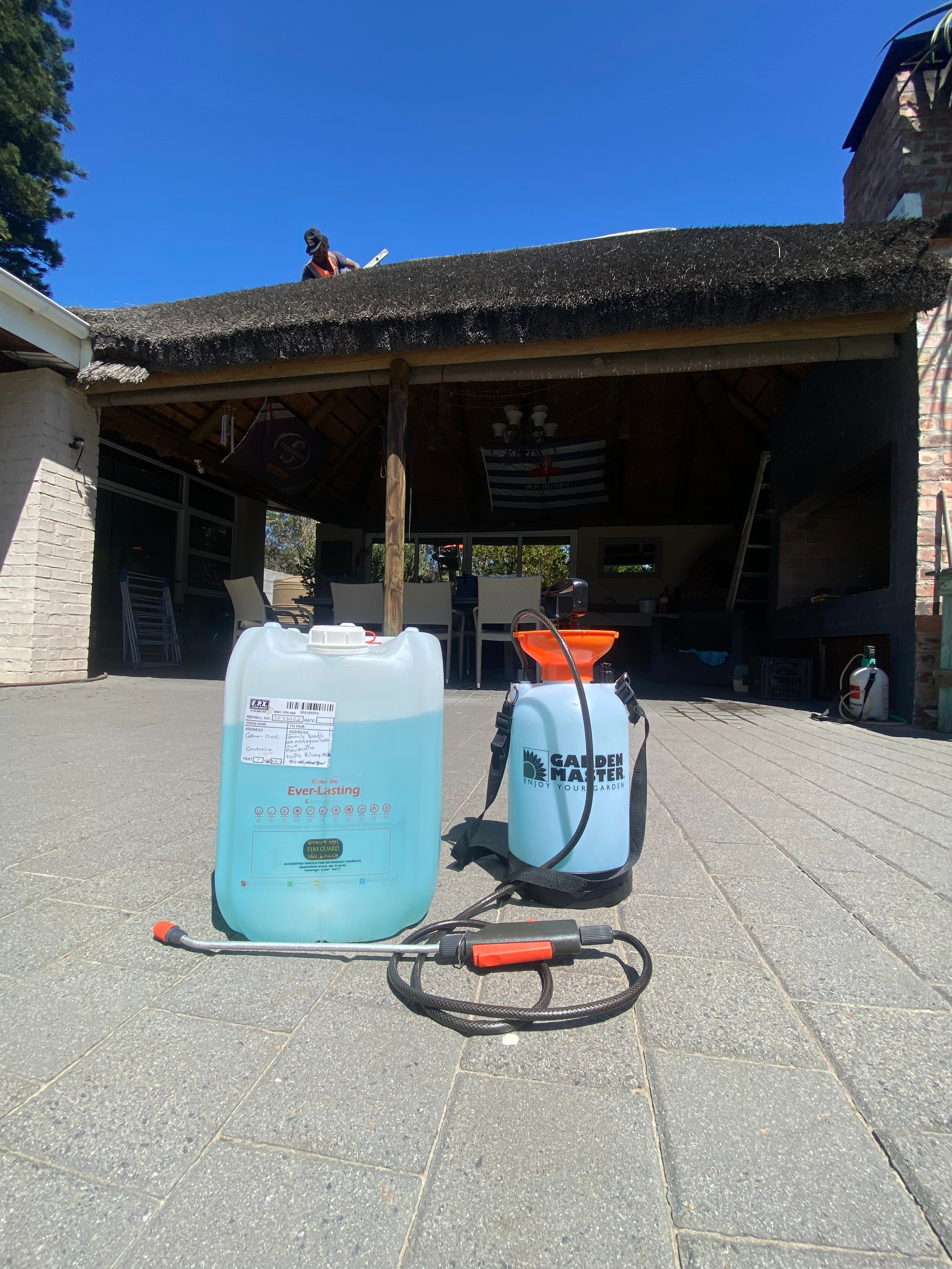 Fire retardant treatment equipment — sprayer and solution used for thatch roof application